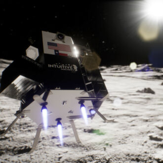 A small spacecraft is moving across a grey rocky surface in front of a black sky.